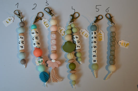 Sleutelhanger juf en meester