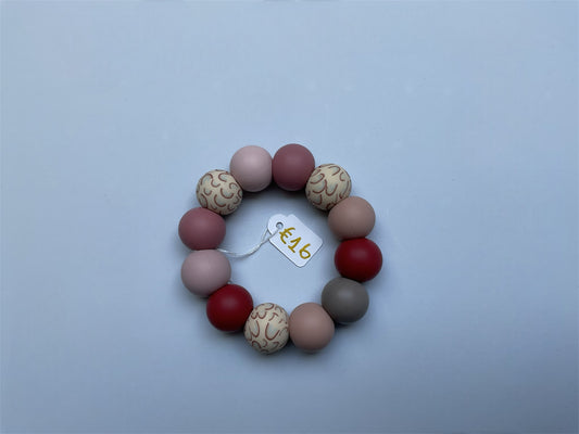 Bijtring dark pink rainbow